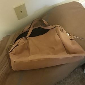 Soft leather, tan satchel.